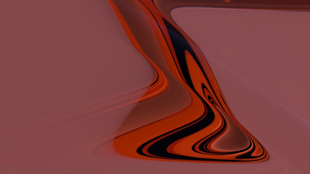 A captivating abstract image featuring fluid motion with deep red and black tones, adding a modern artistic touch.